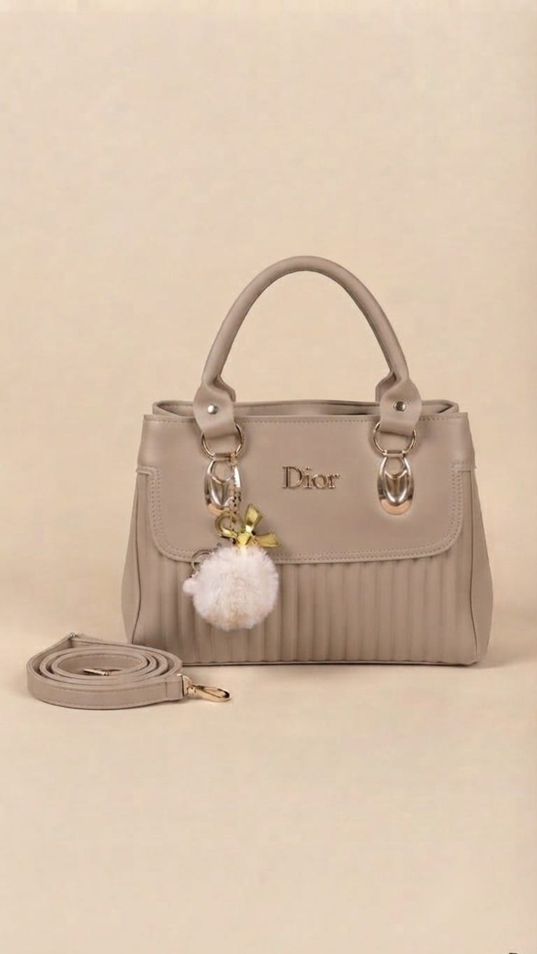 Elegant Pleated Leather Handbag with Fur Charm & Crossbody Strap